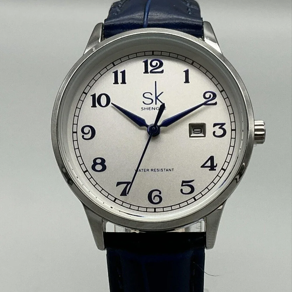 Shengke Womens Watch 32mm Silver Tone Blue Leather Band Date New Battery